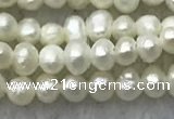 FWP05 14.5 inches 2mm - 2.5mm potato white freshwater pearl strands