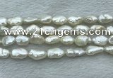 FWP353 15 inches 9mm - 10mm baroque white freshwater pearl strands